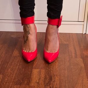 Patent Red pumps